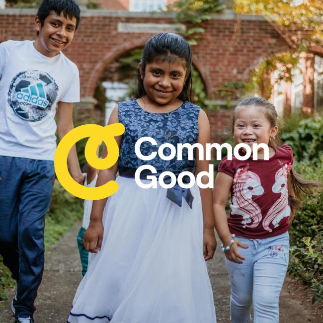 Common Good logo on image with three children looking at camera and smiling.