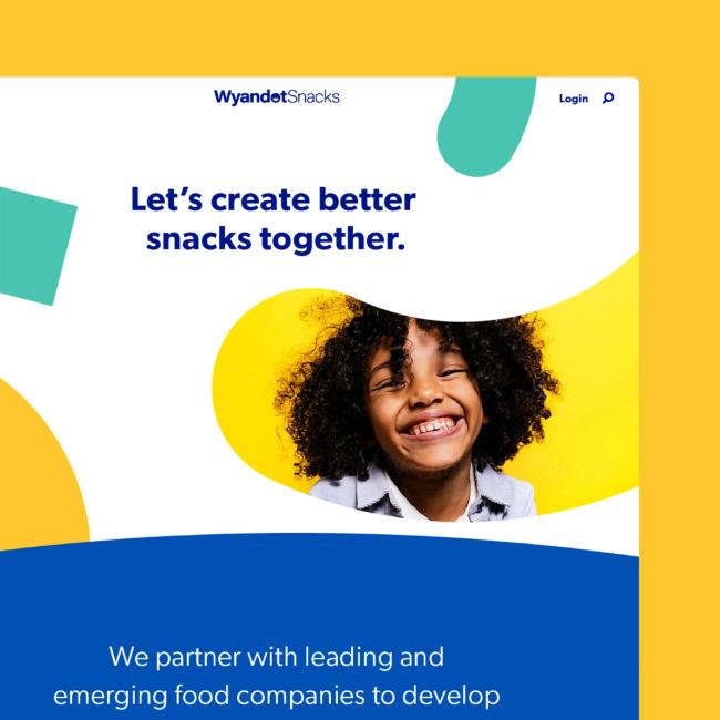Screenshot of the upper right corner of a Wyandot Snacks web design mockup with a smiling child as the main focal point.
