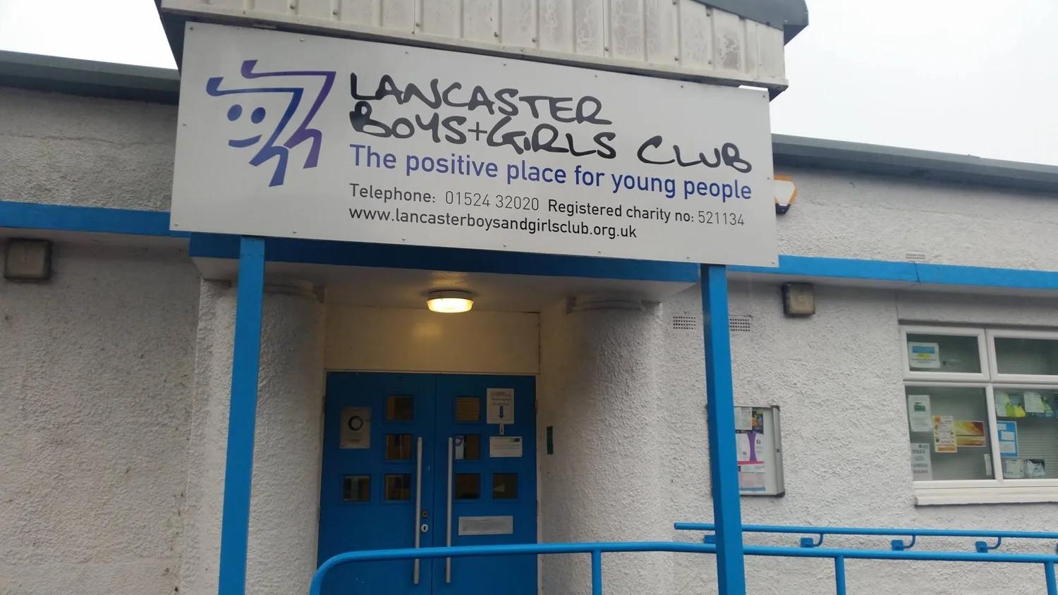Young people and staff at a club event