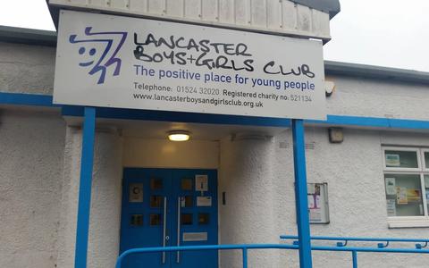 Young people and staff at a club event