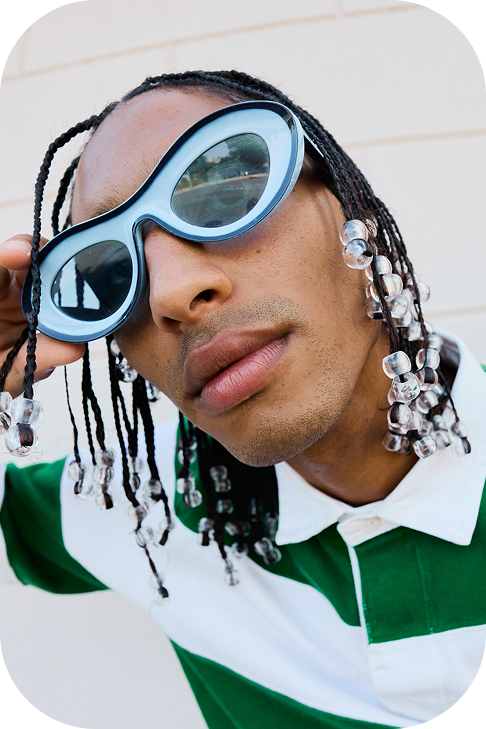 Blond white girl with rings and green blouse