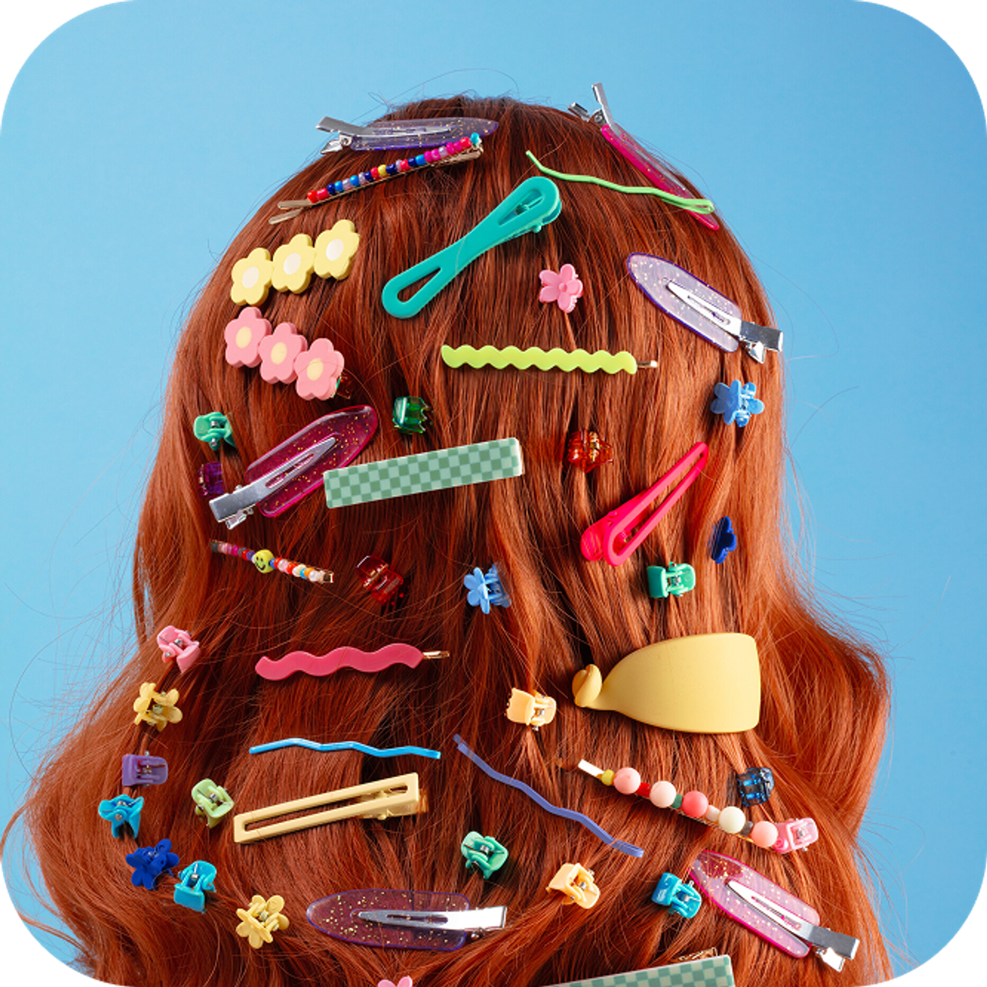 Woman dressed in blue showing her rings 