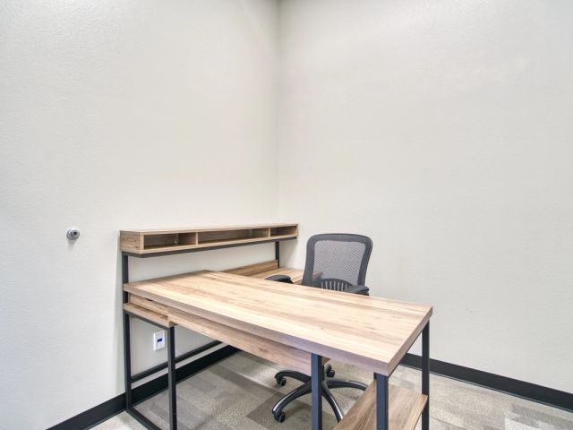 Dedicated desk with cubby hutch at Leaf Coworking, Firestone, CO