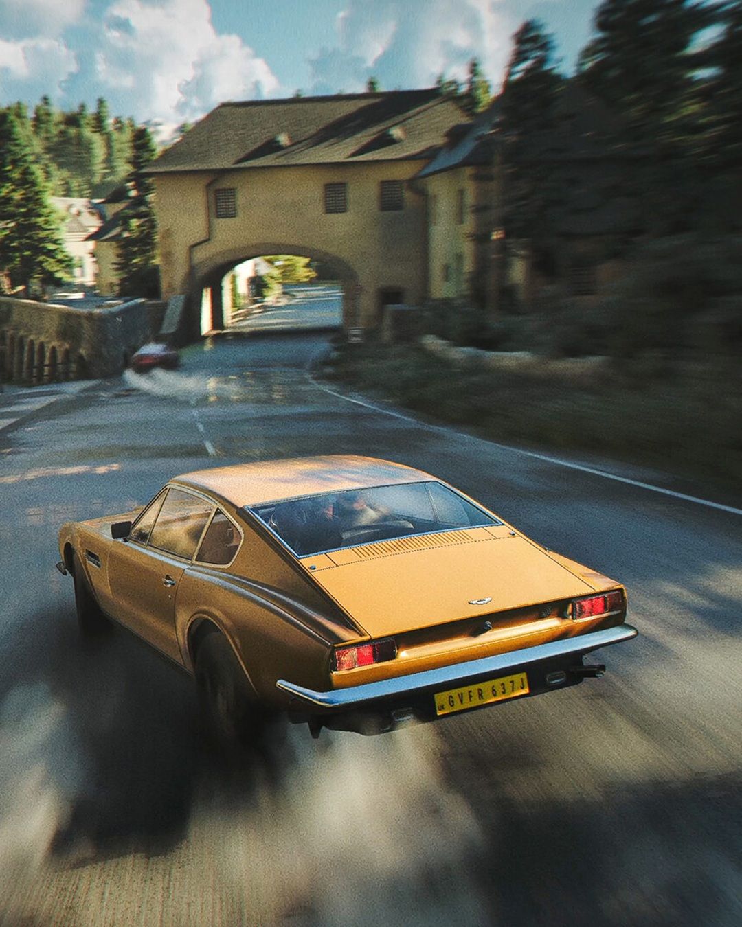 An Aston Martin drives through a mountain road in 007 First Light.