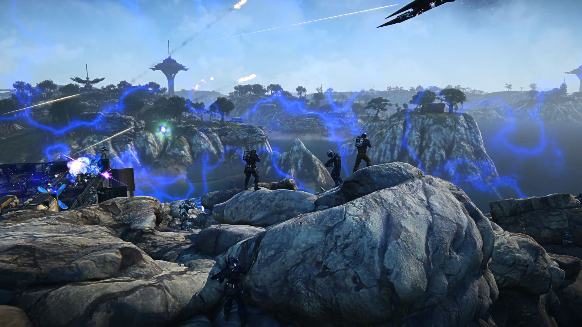 Infantry and aircraft fight across rocky terrain in an official PlanetSide 2 screenshot.