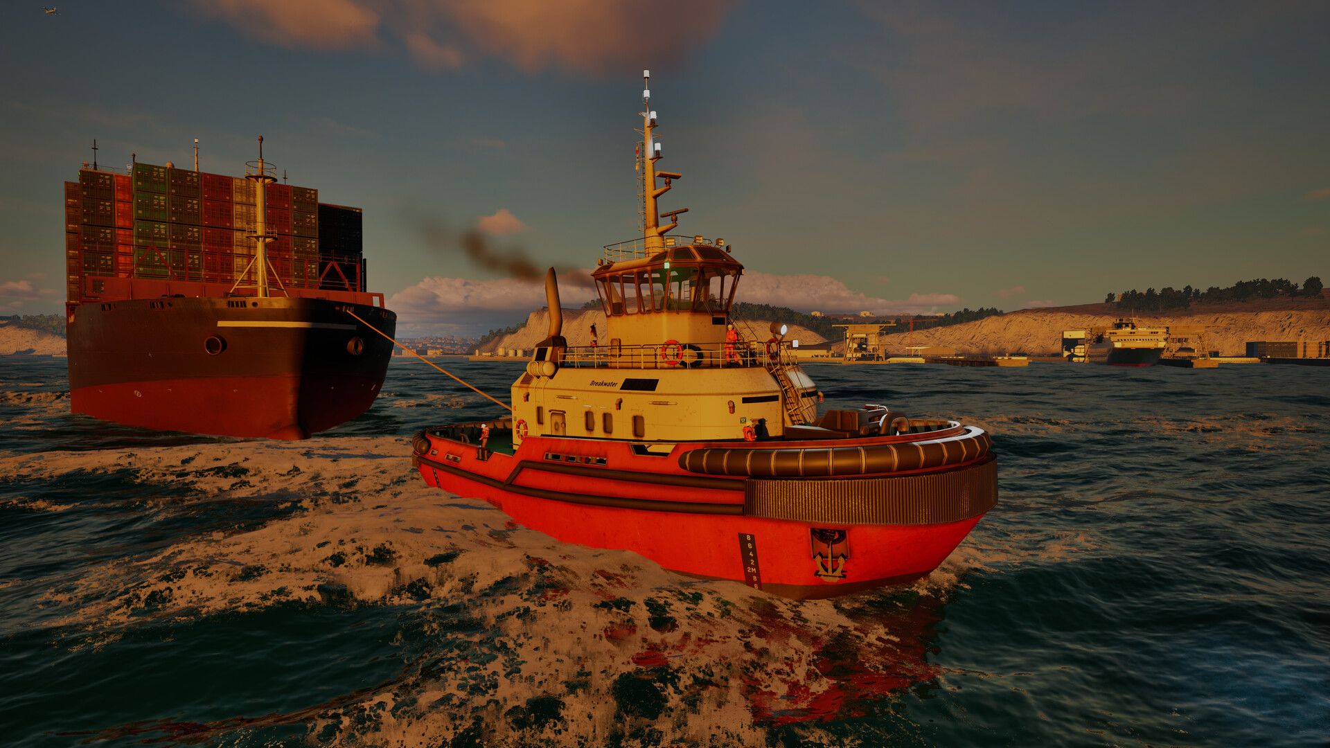 A red and yellow tugboat beside a cargo ship in Professional Ship Simulator
