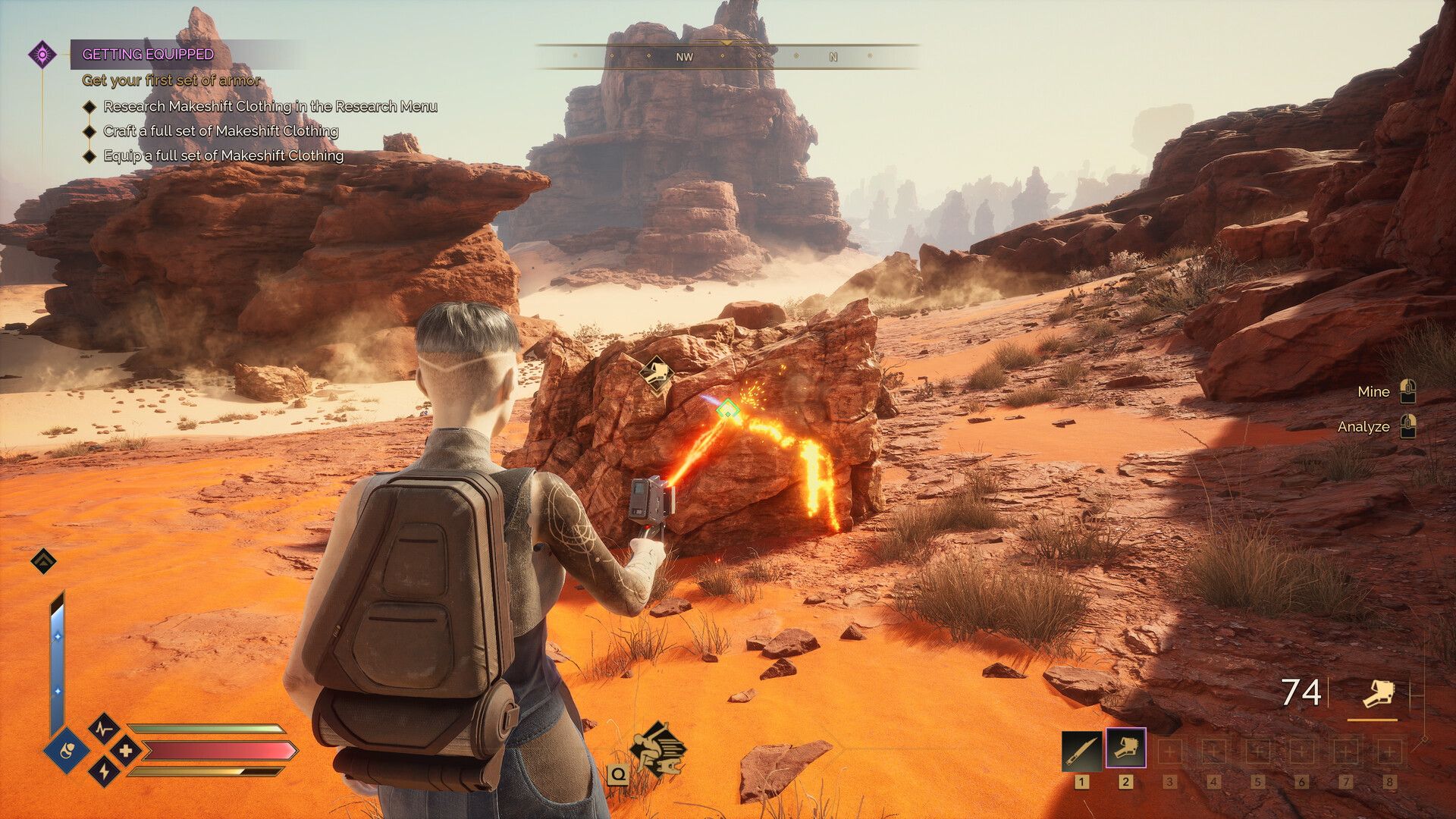 A Dune: Awakening player mines ore in the desert