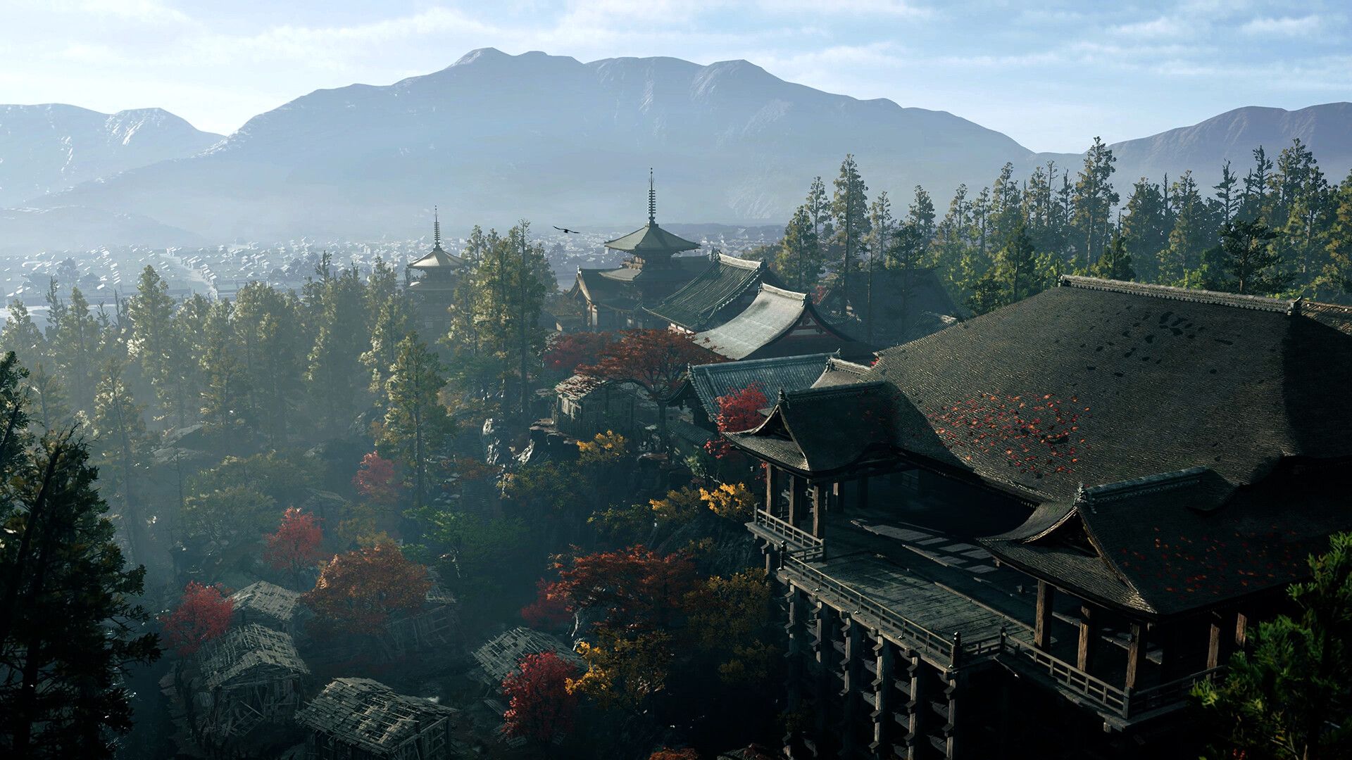An elevated view of temples and autumn trees in Kyoto