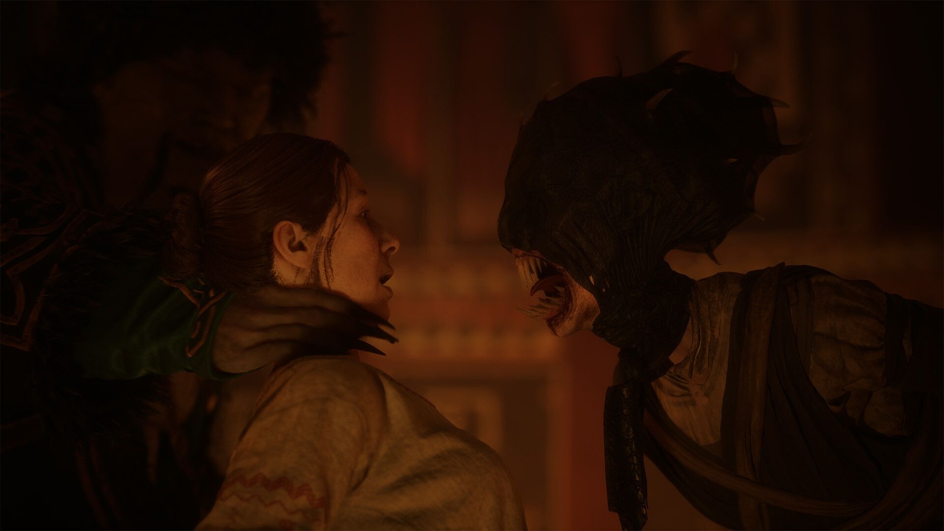 A frightened woman faces a snarling creature at close range