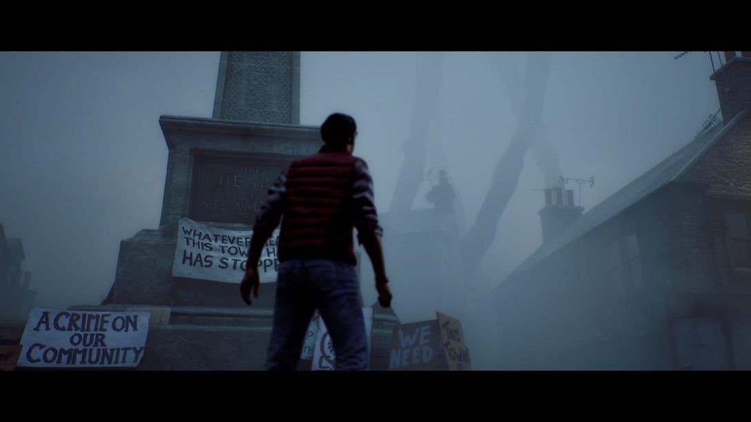 Simon stands in the foggy town of St. Amelia in Silent Hill Townfall