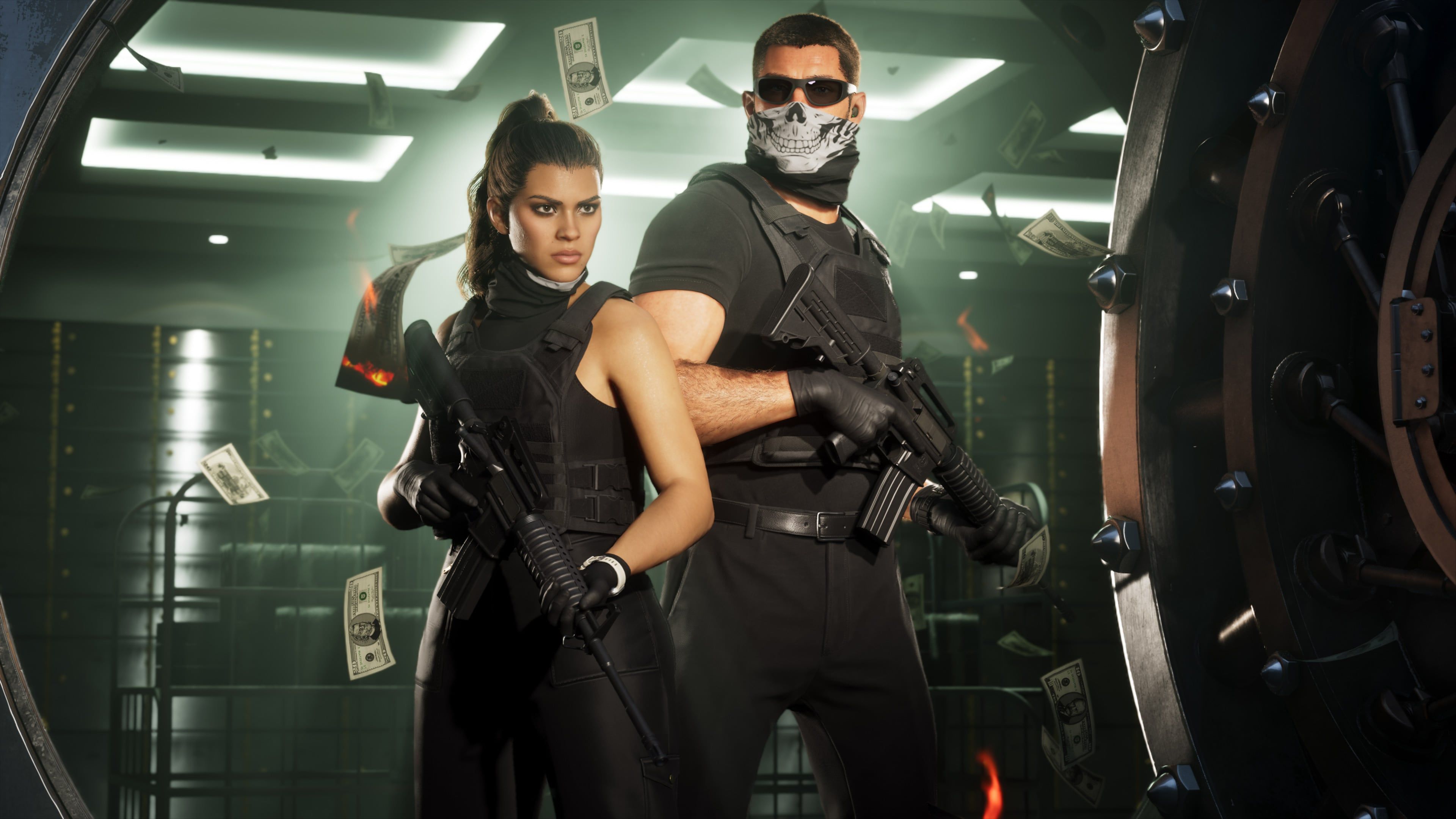 Jason and Lucia stand inside a vault in an official GTA VI screenshot.