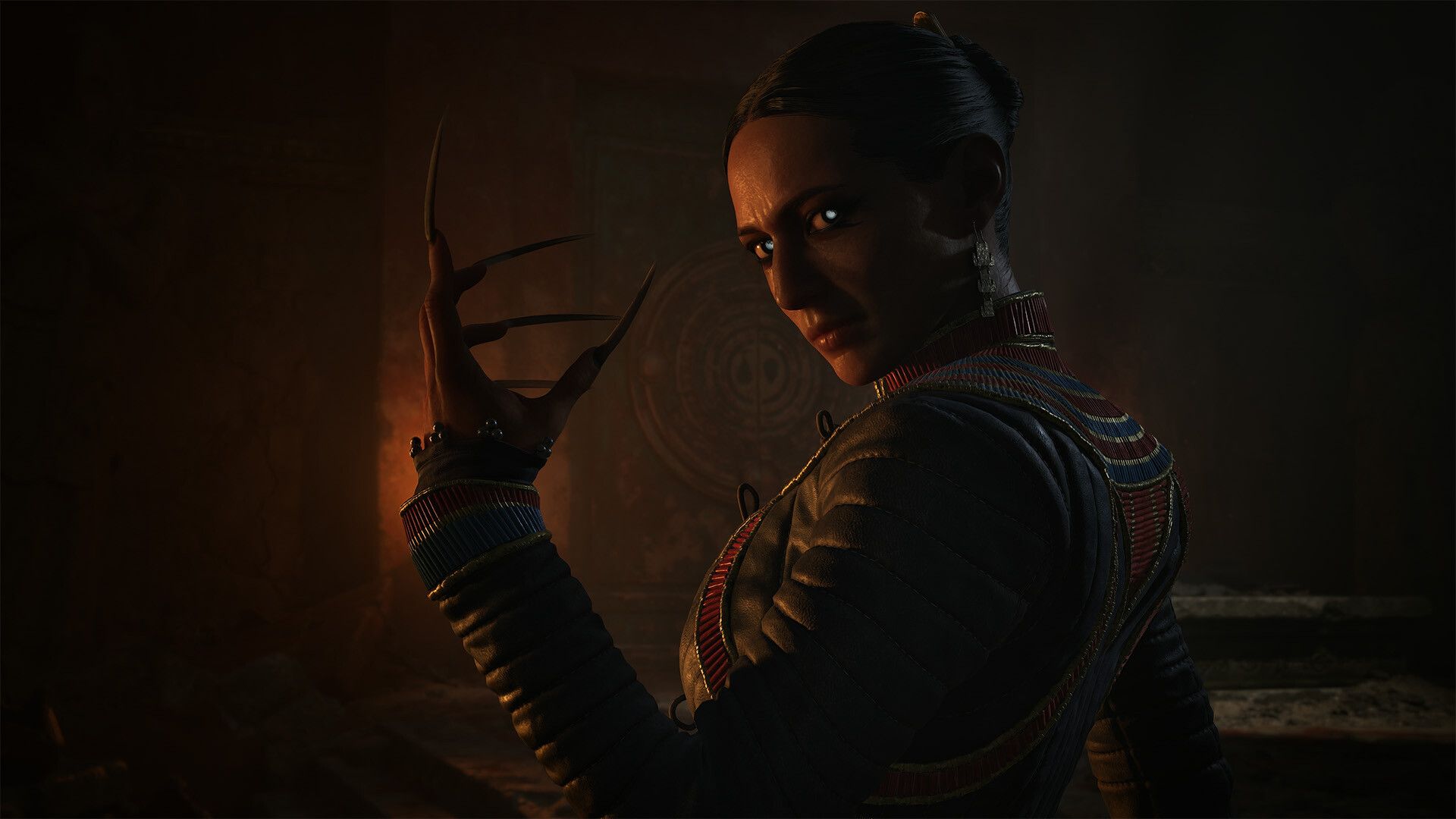 A glowing-eyed woman raises a clawed hand in a dark interior