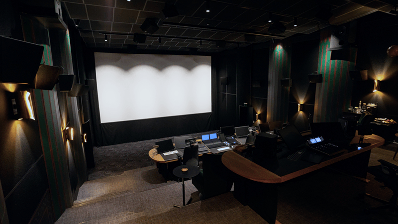 Tint Post's cinema mixing and grading stage in Gothenburg with a large screen and control desks