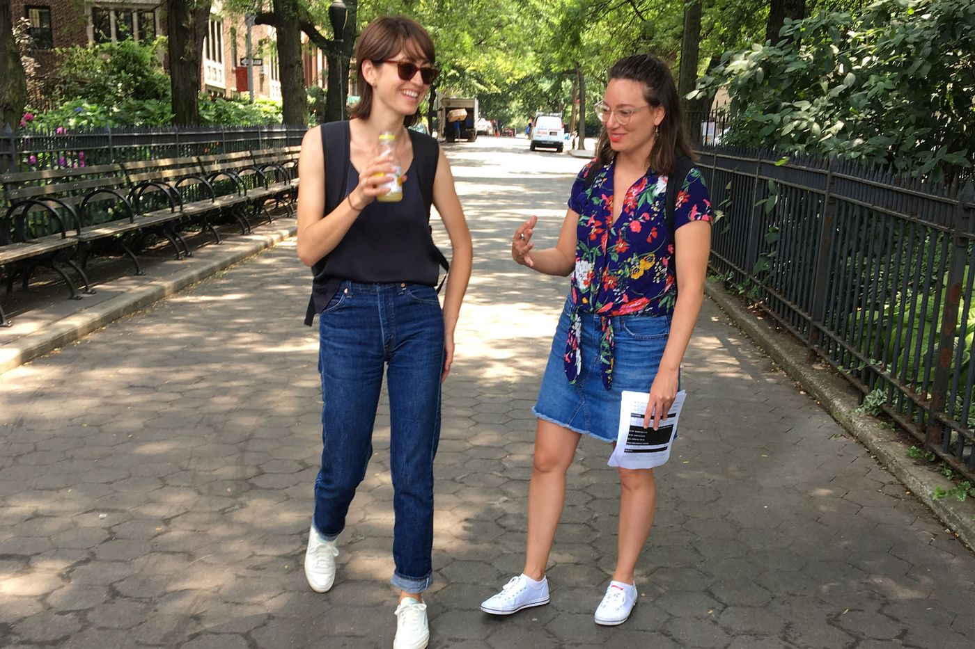 Location coordinator Lauren Taylor walking with Hannah Pearl Utt, star of Before You Know It, on a tree-lined path
