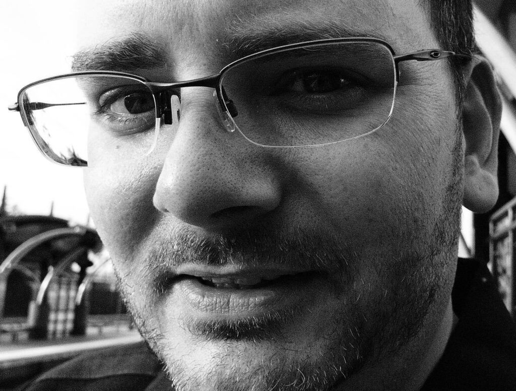 Black and white close-up portrait of Jeff Miller, Senior Pre-Sales Engineer, webinar speaker