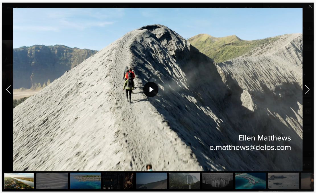 Spotlight video player with a SafeStream visible watermark showing the viewer's name and email