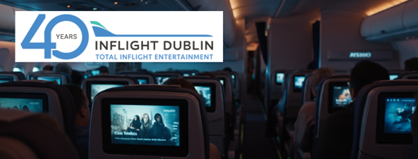 Inflight Dublin 40 years logo over an airplane cabin with seatback entertainment screens