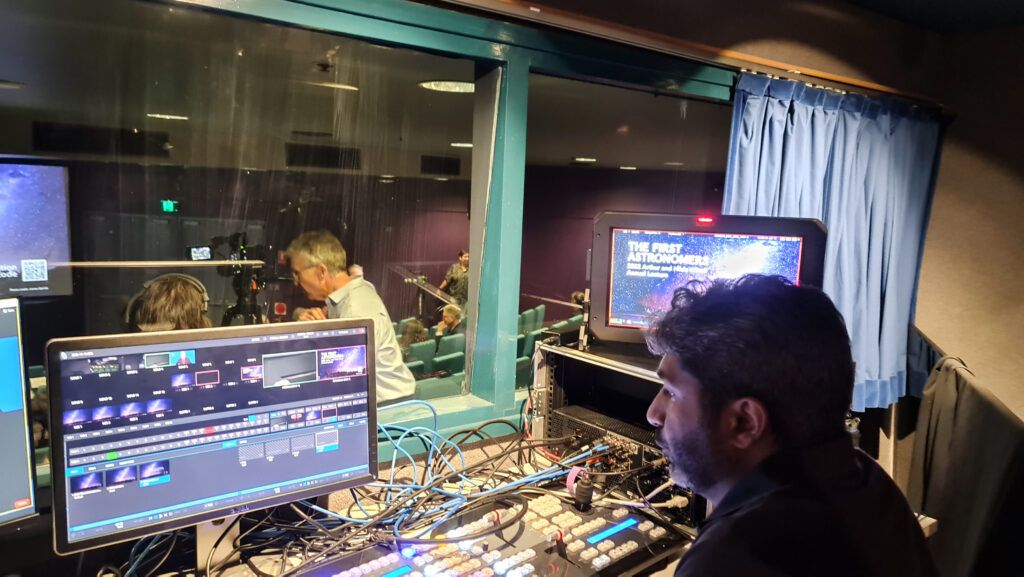 EditShare shared storage in use at the University of Sydney, with an operator running a live switcher in a lecture theatre control booth