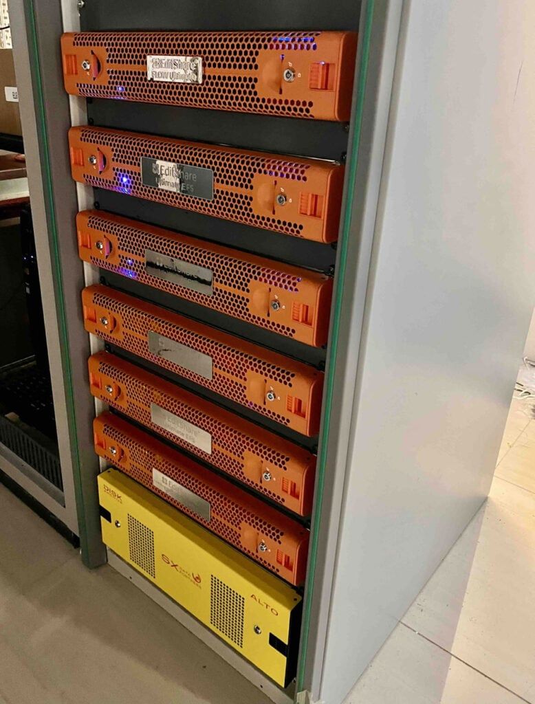 Rack of orange EditShare FLOW and Ultimate EFS storage units installed at Fiji TV