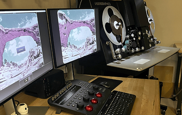 Film scanning workstation at George Blood LP with a Lasergraphics scanner, dual monitors and a color grading panel