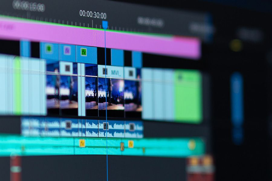 Close-up of a video editing timeline with clips, effects and audio tracks
