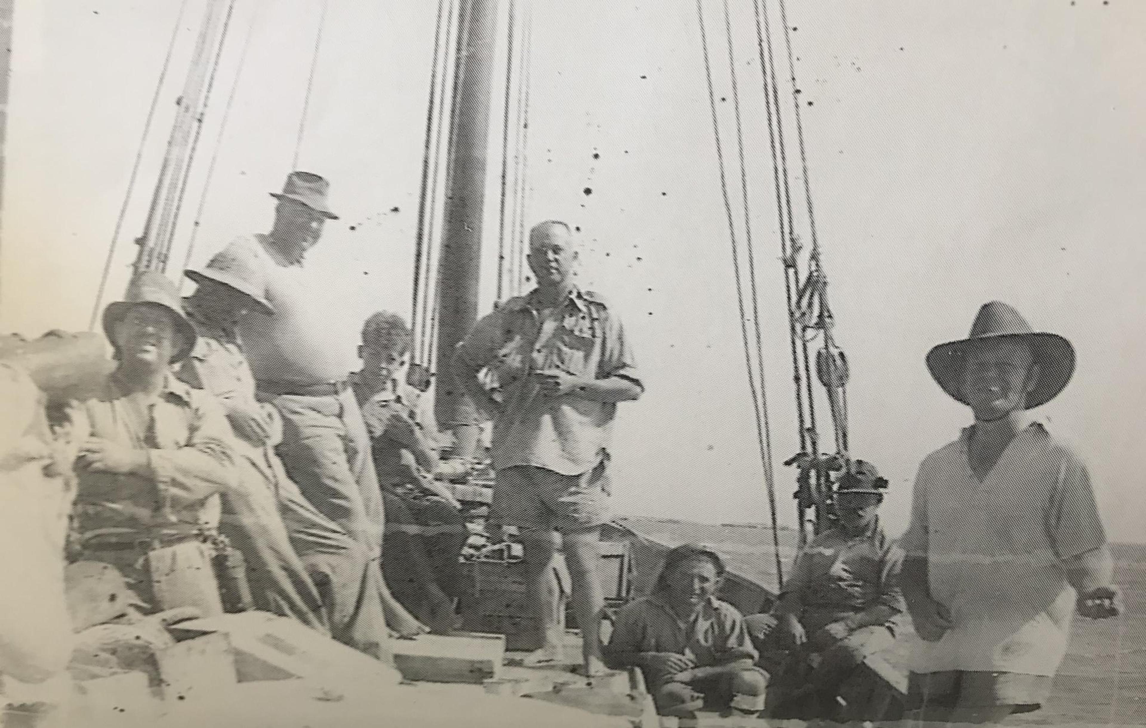 Pacific Crew third from left Gaetano Travia, Frank Travia, Jim Millwood, Vince Merendino and King Phillip sitting on the Gunwhale
