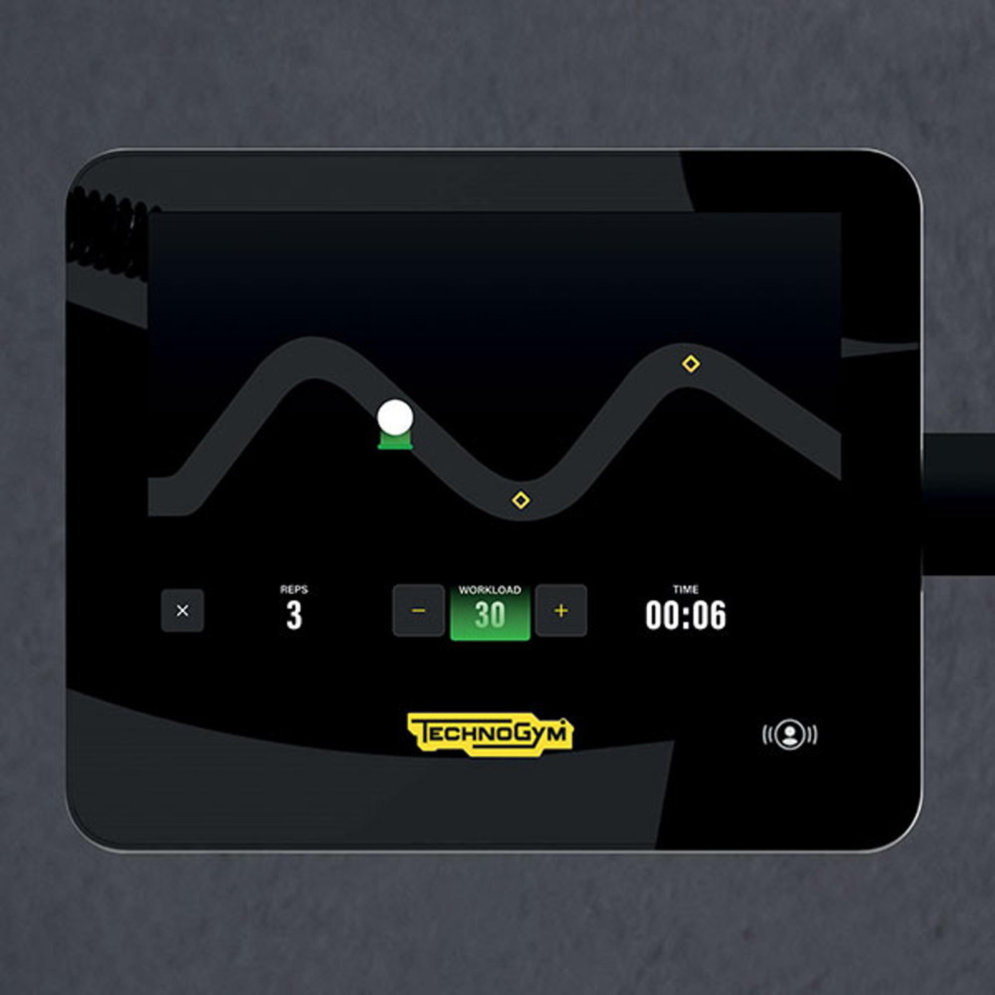 Technogym Fitness Display showing workout metrics including reps, workload, and time