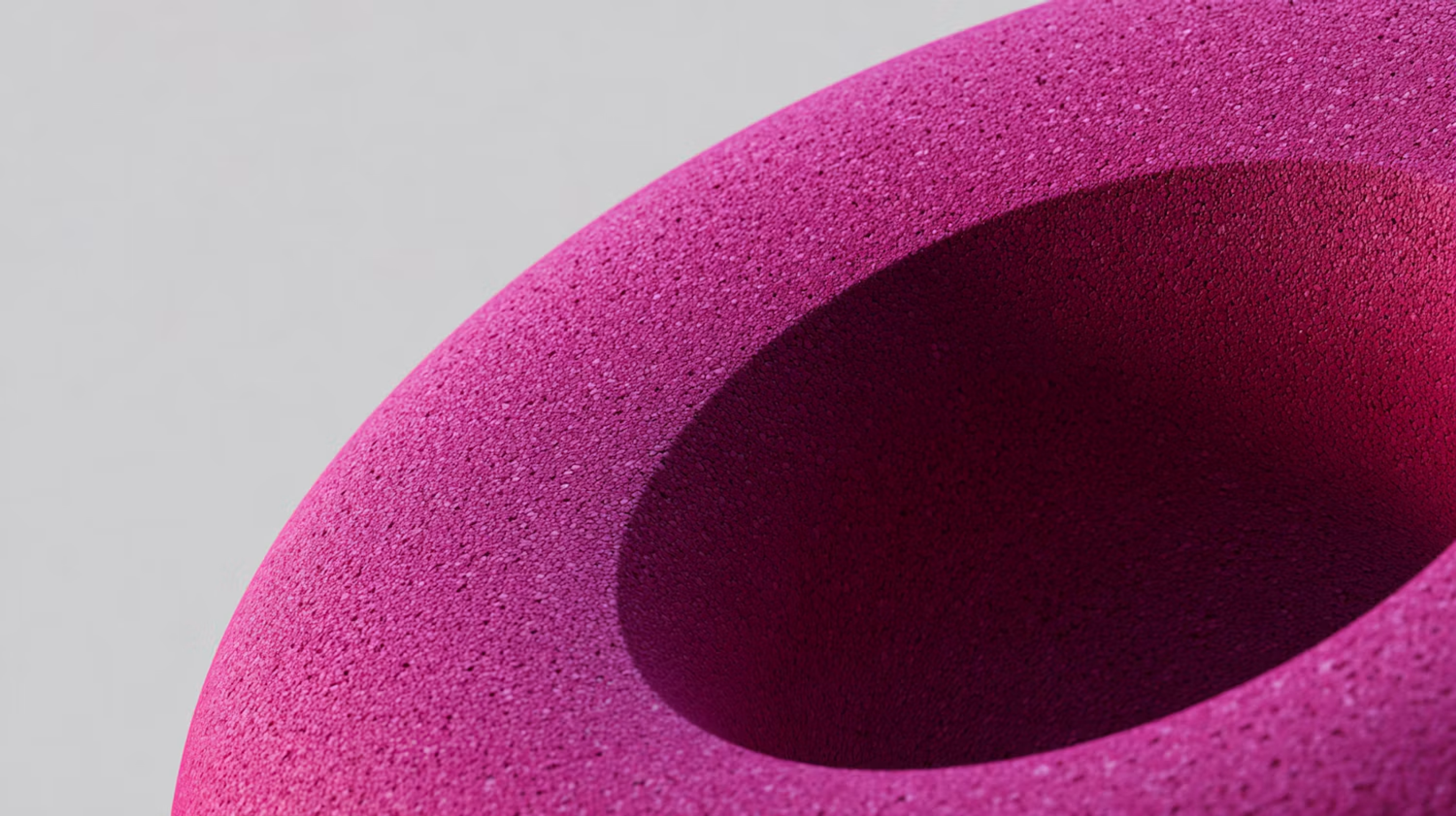 Magenta textured shape on grey