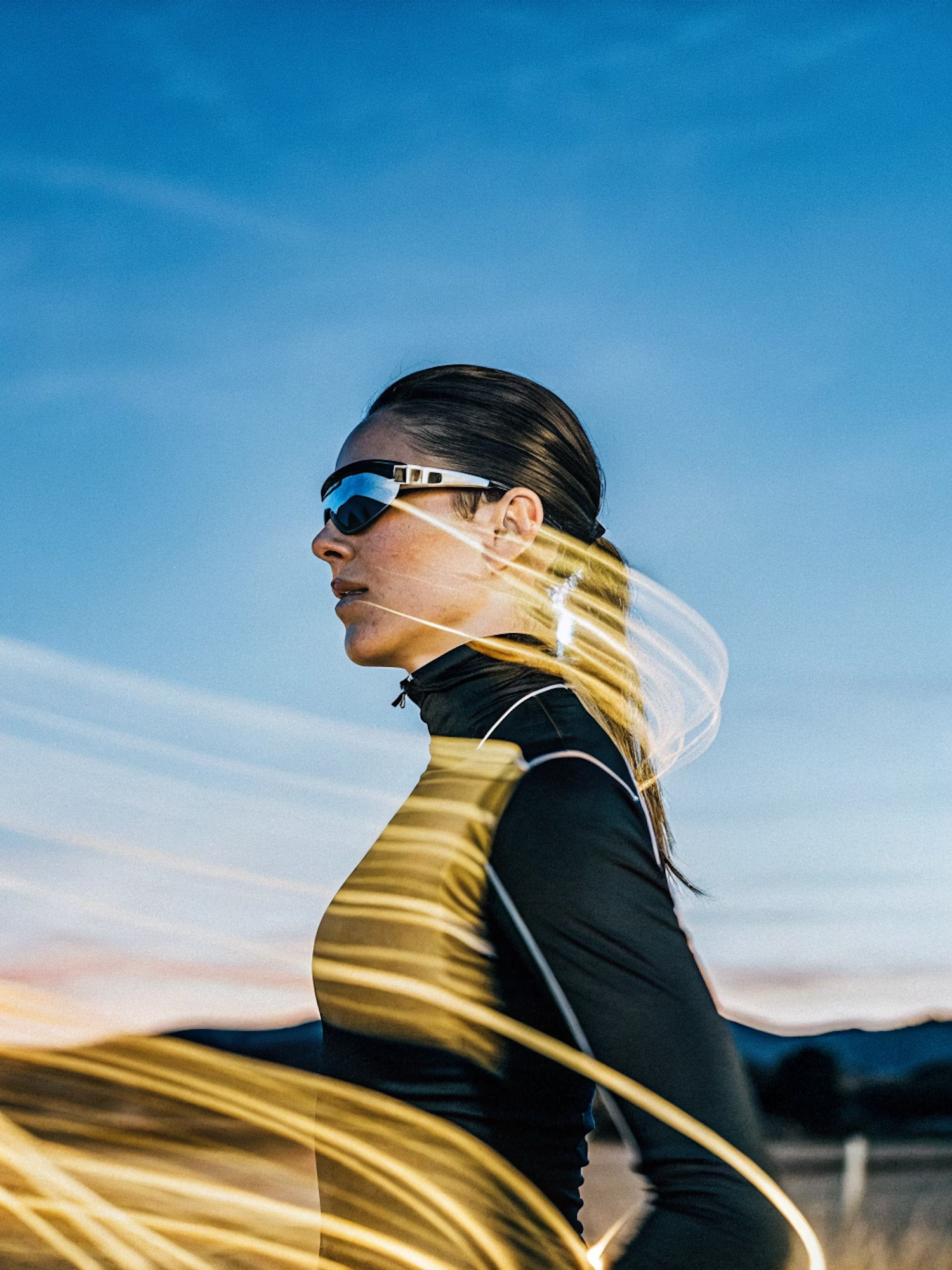 Woman in sports glasses with motion trails