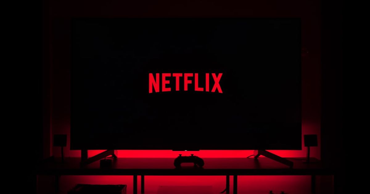 Can You Watch Netflix on CarPlay? What Actually Works — flat screen television displaying Netflix logo
