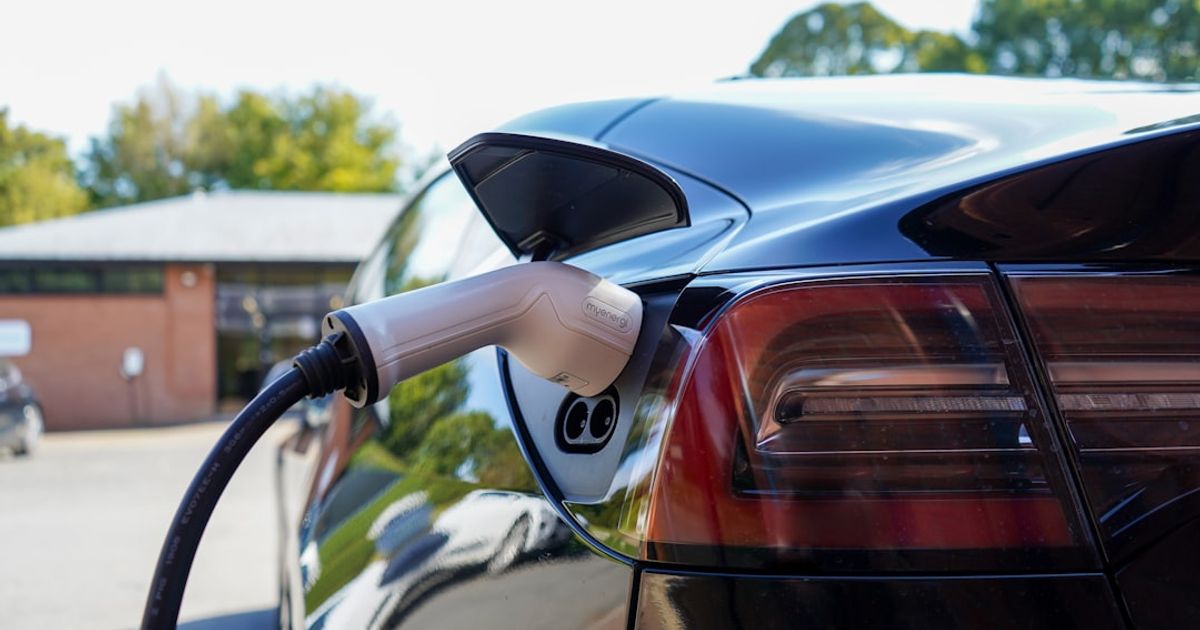 CarPlay for Tesla: 5 Workarounds That Actually Work (Model 3 Owner, 6 Months Tested) — black car in tilt shift lens