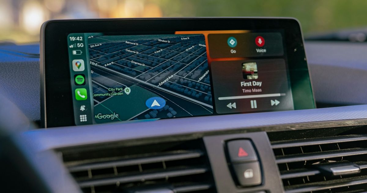 Apple CarPlay dashboard on a car's built-in screen showing navigation and music — the starting point for diagnosing why CarPlay is not working