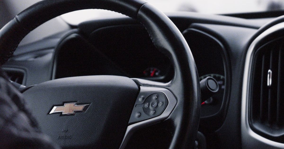 Chevrolet Apple CarPlay Not Working? Fix It on Silverado, Equinox, Tahoe & Bolt EV — black honda car steering wheel