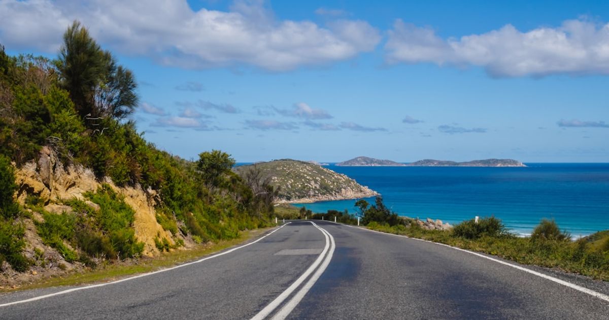 Is Using CarPlay Legal in Australia? Rules by State — curved road near cliff