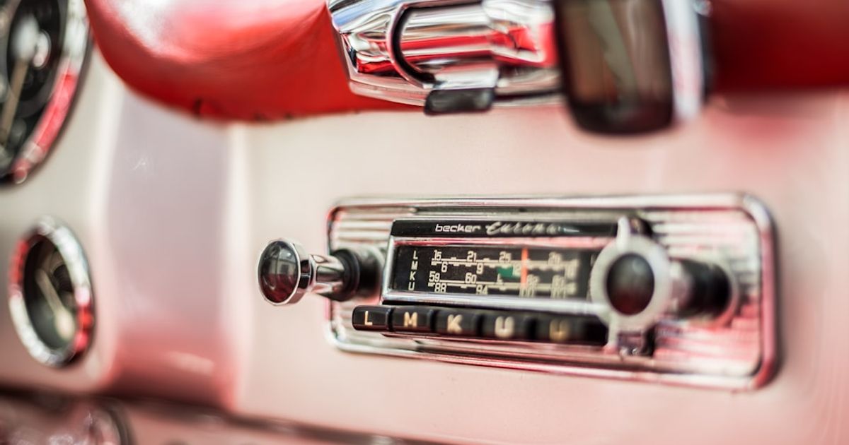 How to Get Live Lyrics on CarPlay (iOS 26 Complete Guide) — red and silver car engine