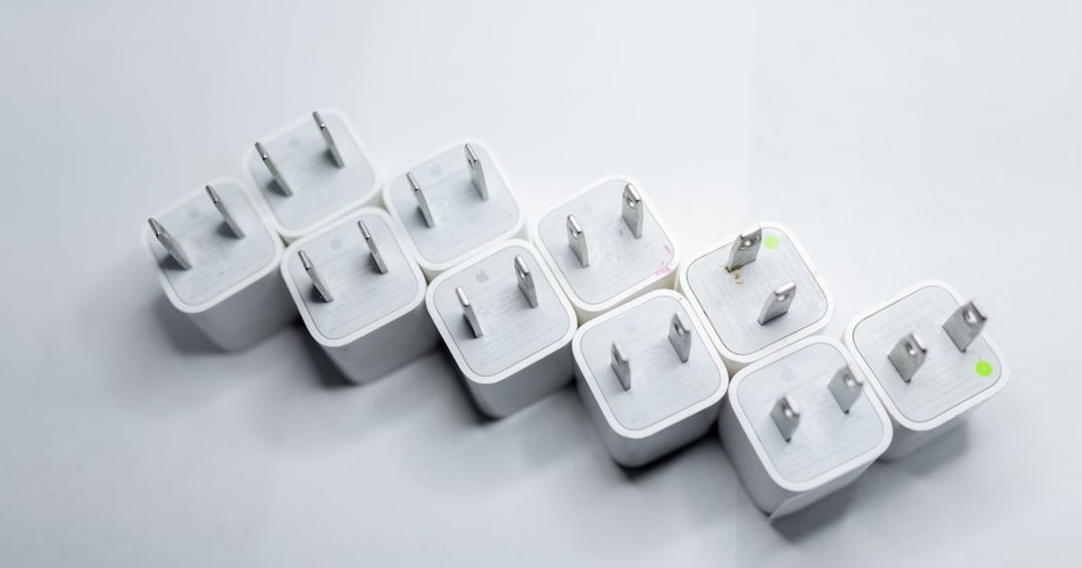 Carlinkit 5.0 Review (2026): Four Months Later, Is It Still the Adapter to Buy? — white plastic 4 layer rack