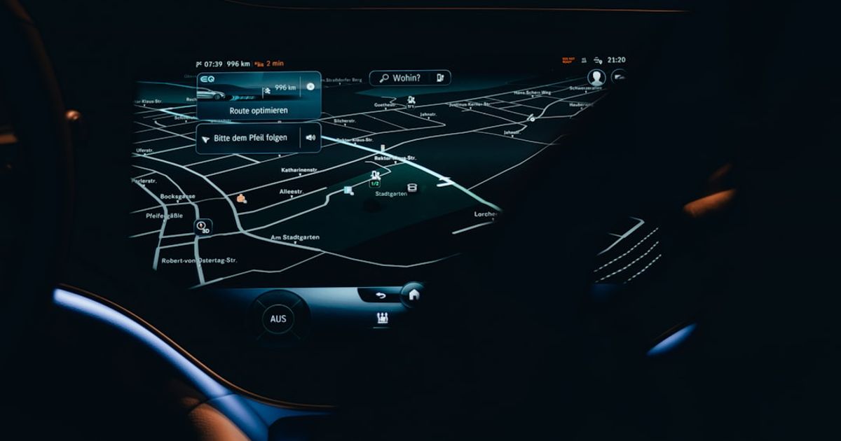 What Is Next-Generation CarPlay, and Can You Get It? — the dashboard of a car with a map on it