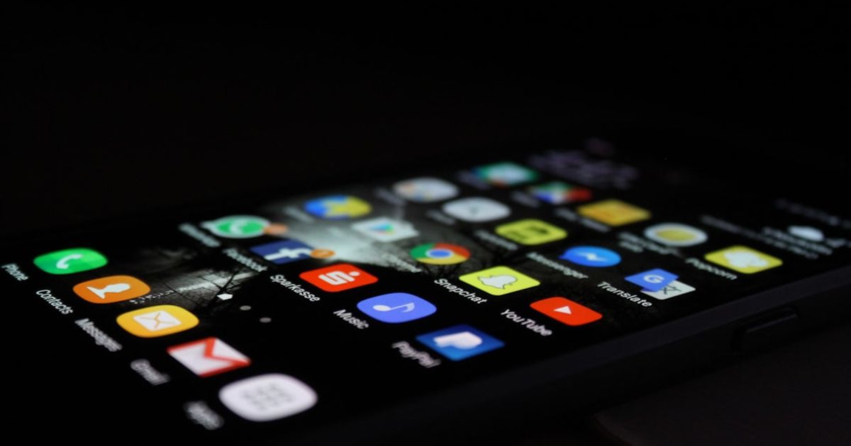 CarPlay Apps: Which Ones Work on the Car Screen, and How to Add Them — silver Android smartphone