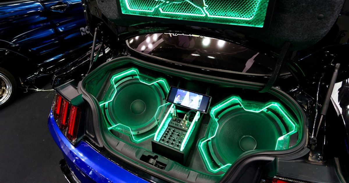 Custom CarPlay Startup Sound: A Field Guide to Both Methods (iOS 26) — A car that has some speakers in it