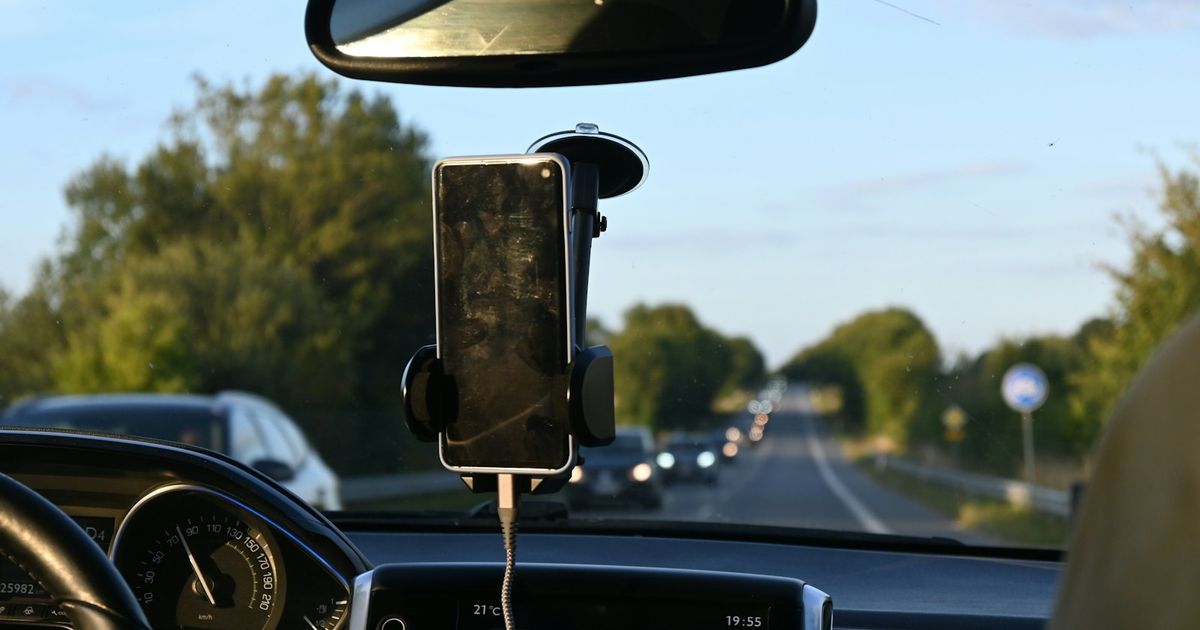 CarPlay Keeps Disconnecting? Read the Drop Pattern, Then Apply These 9 Fixes — a car dashboard with a cell phone attached to it