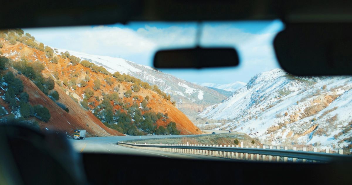 Driving on a bright mountain road