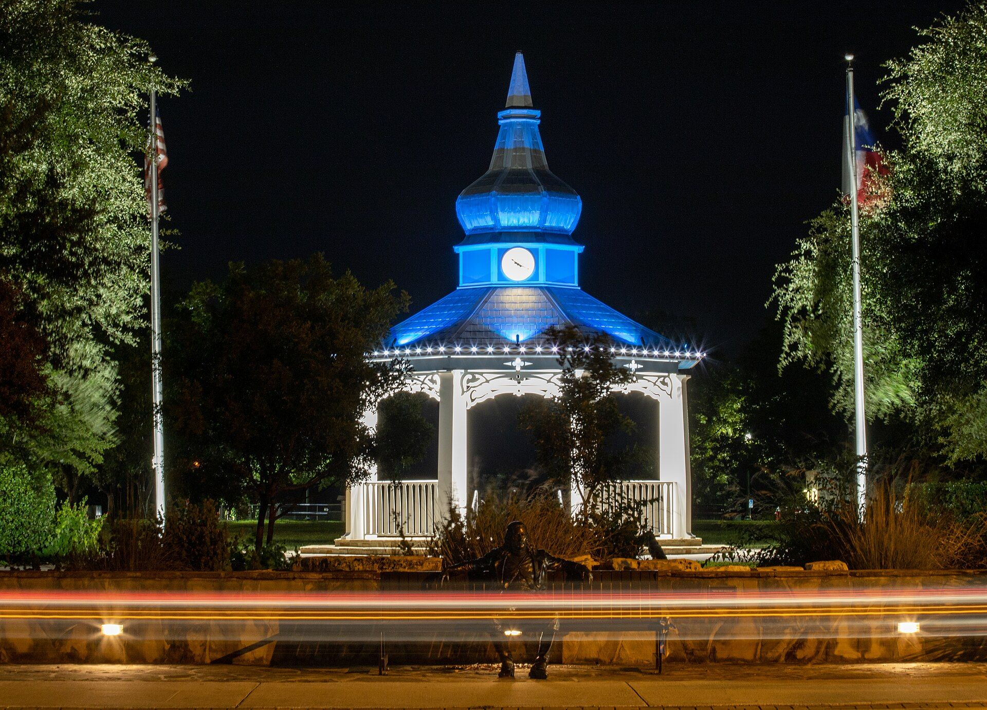 The illuminated gazebo at Boerne's Main Plaza at night.