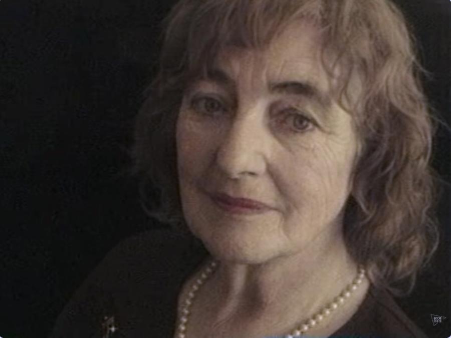 Sepia portrait of Laura’s grandmother, Rosa, wearing pearls