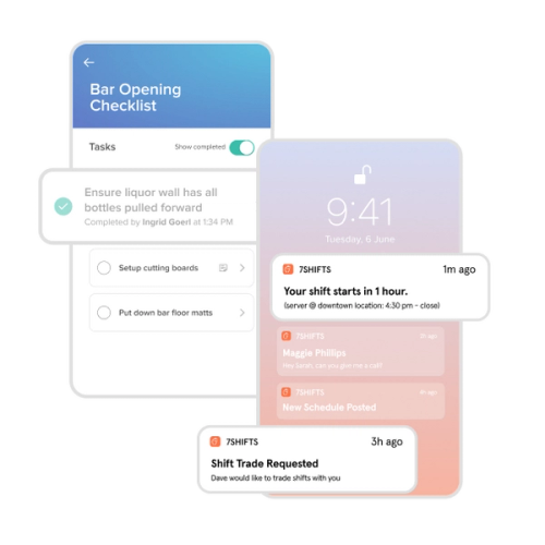 Restaurant manager with laptop training employee