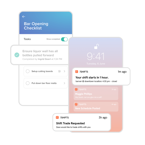 Restaurant manager with laptop training employee