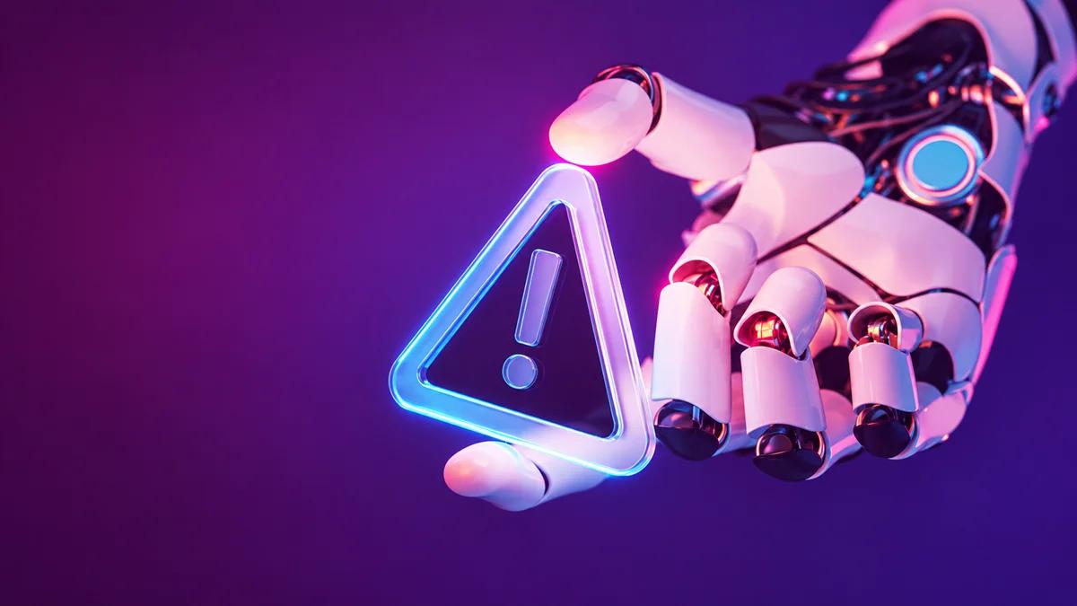 Robotic hand holding a glowing warning symbol against a purple background