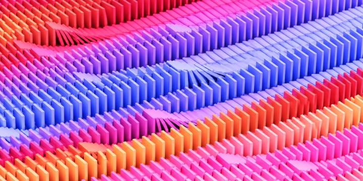 Abstract pattern of repeating geometric shapes in pink, orange, purple and blue