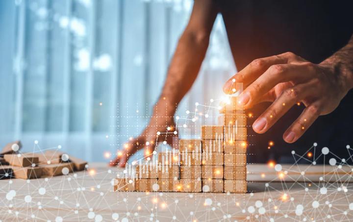 Business growth and capability development represented by building blocks and digital technology