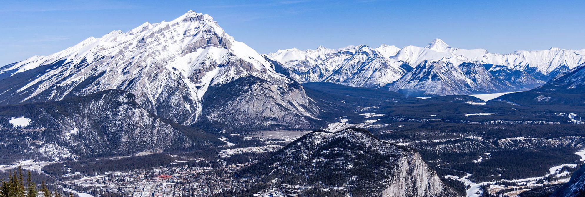 The Banff Townsite from the Banff Gondola with Tunnel Mountain and Cascade Mountain in Banff National Park.