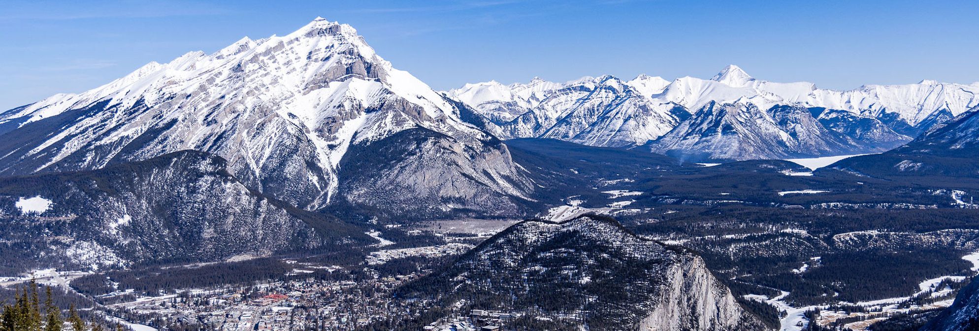 The Banff Townsite from the Banff Gondola with Tunnel Mountain and Cascade Mountain in Banff National Park.